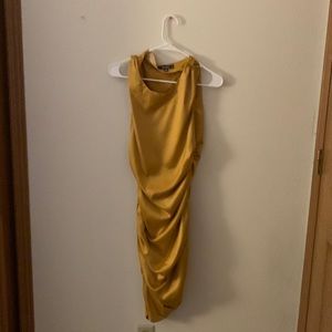 This misguided dress is size 4 and yellow/gold